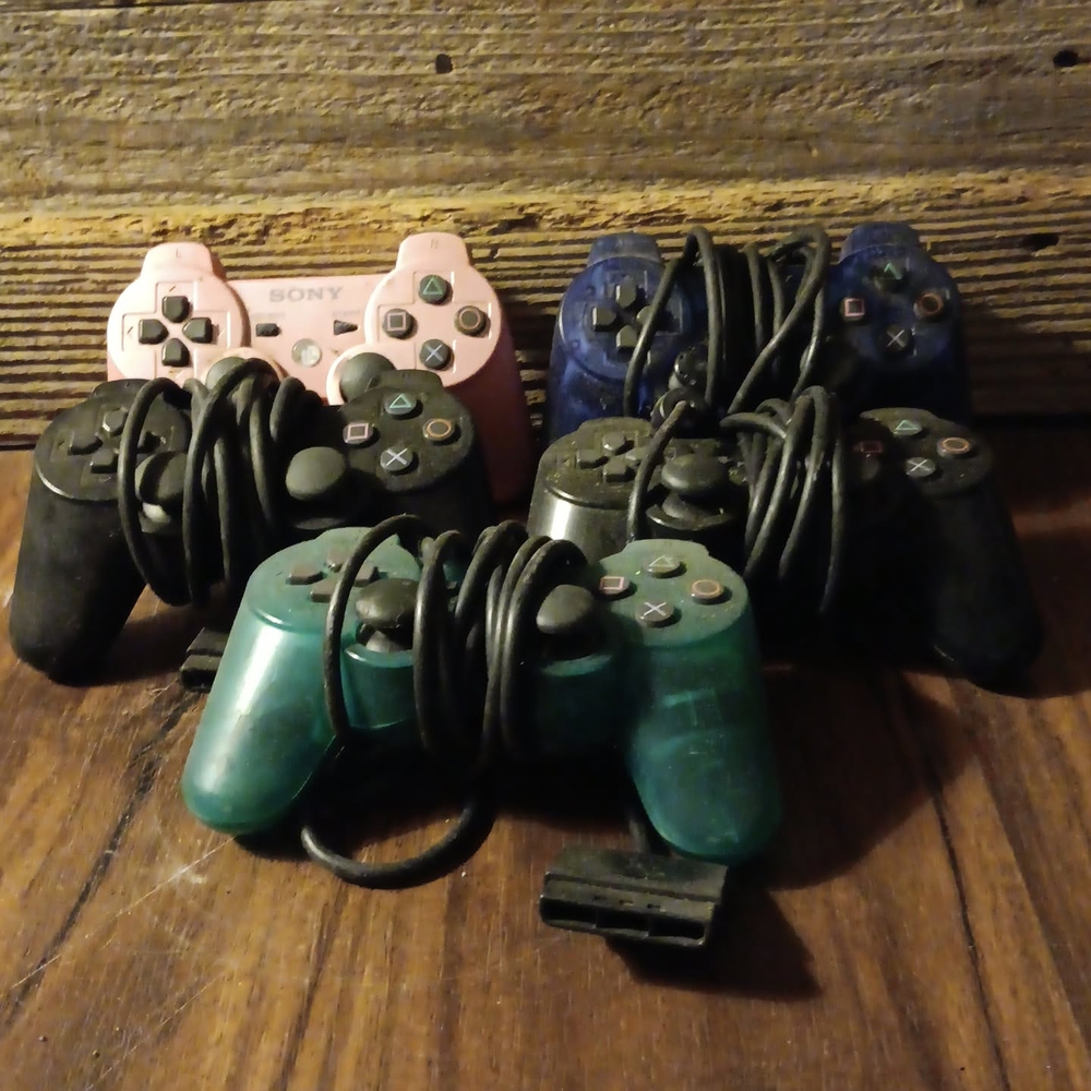 Sony PlayStation Controllers - Pink, Blue, Black, Green